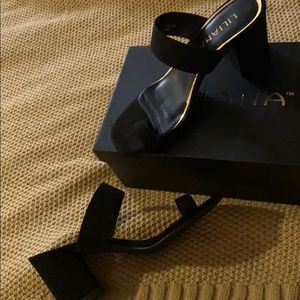 Heels! Black strap small platform heel.